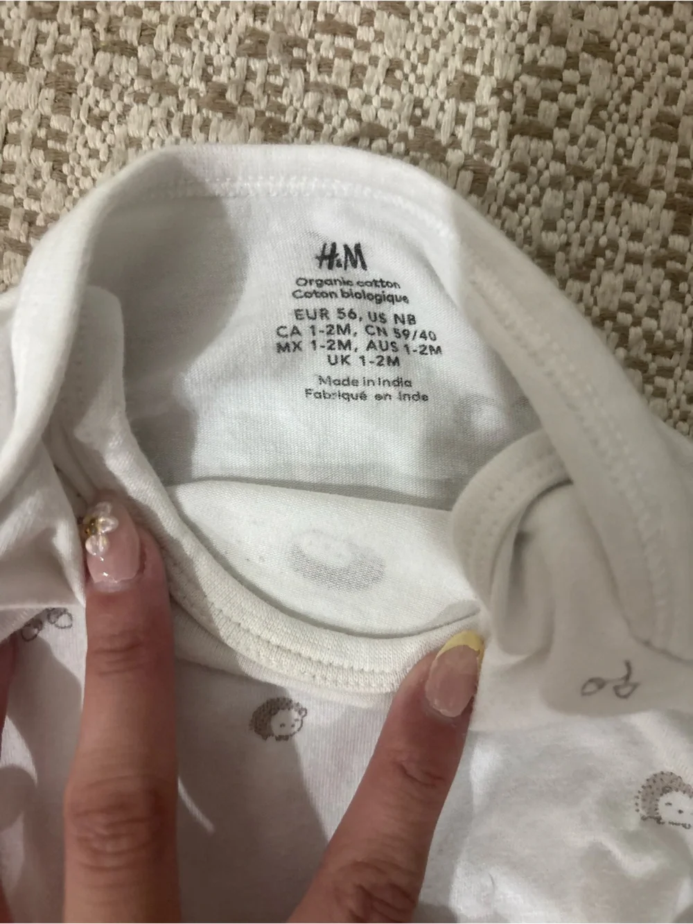 H&M White Baby One-Piece with Small Taupe Animal Motifs